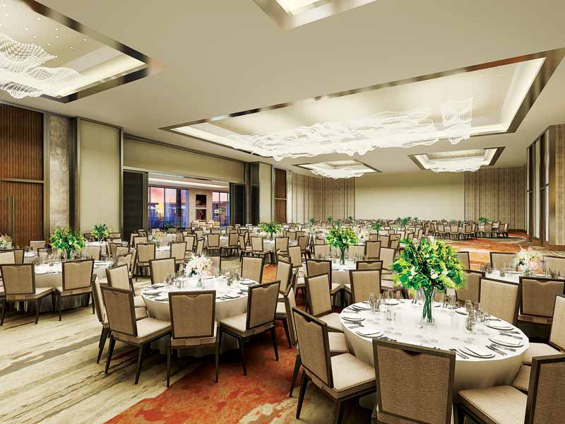 Multiple 8-seat round tables arranged for events.