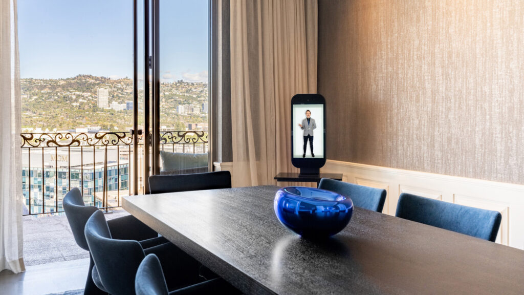 The hologram is placed atop a dining table.