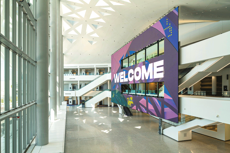 A welcome board inside the convention center.