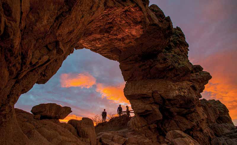 People enjoy the natural attractions of Loveland at twilight.