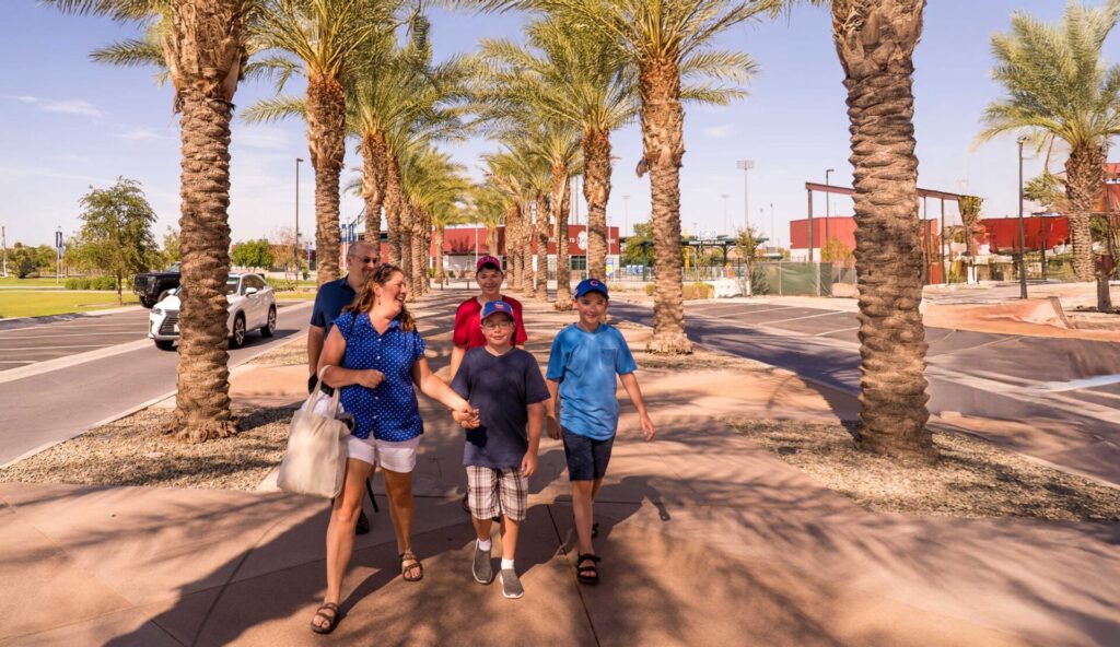 A family walks along a street.