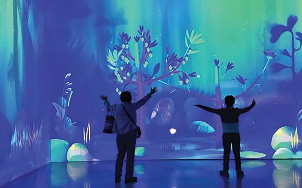 People experiencing the immersive Dream Garden.